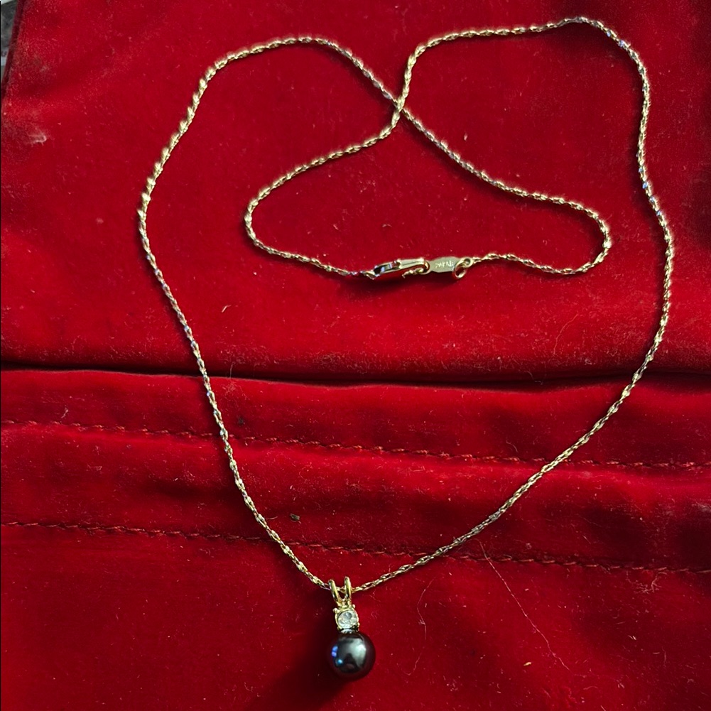 Gold And Black Necklace With Classic Pendant